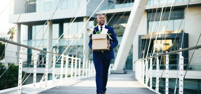 Happy, black man or leaving business with box for new career, job opportunity or migration in city. Businessman, change or startup with work equipment for relocation or employment promotion on bridge